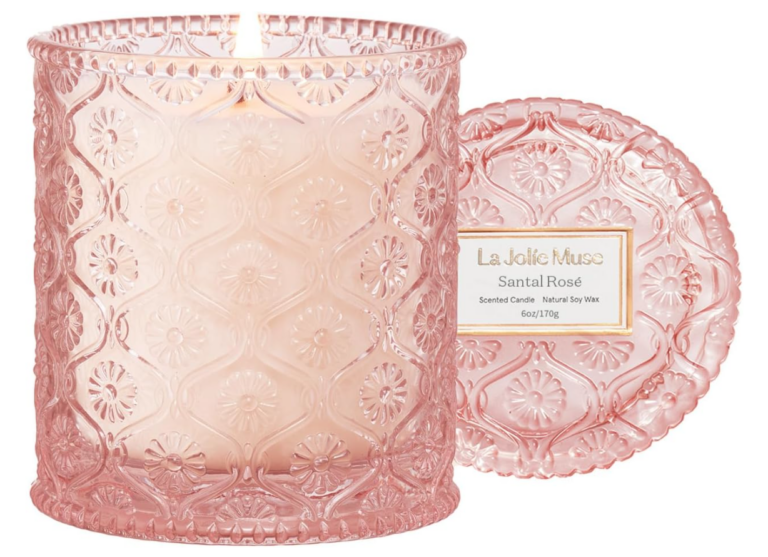 Image of candle in pink glass container.