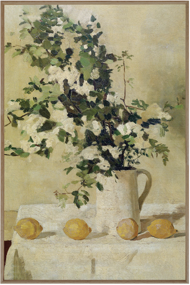 bathroom art ideas. Print of painting of tall white flowers in ceramic white water pitcher for a vase with handle sitting on a table with a white table cloth with 4 lemons in front of it.