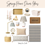 spring home inspiration. Image of multiple spring home decor items including: brass small hand broom and dust pan, pink twist candles in white ribbed candle holder, brass scalloped tray, circular white picture frame, white twisted trinket holder, white canvas storage bin, embossed welcome mat, striped outdoor rug, white lamp with plaid shade, brass measuring spoons, white and pink ceramic mug, brass lamp with floral shade, flower candle holders, blue speckled candle, basket, brass small clock, gingham print pillow, blue and pink pattern pillow.