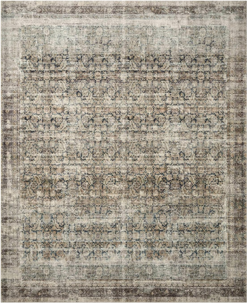 affordable rugs Image of vintage-inspired area rug with browns, greens, blacks, yellows, and pinks with distressed coloring.