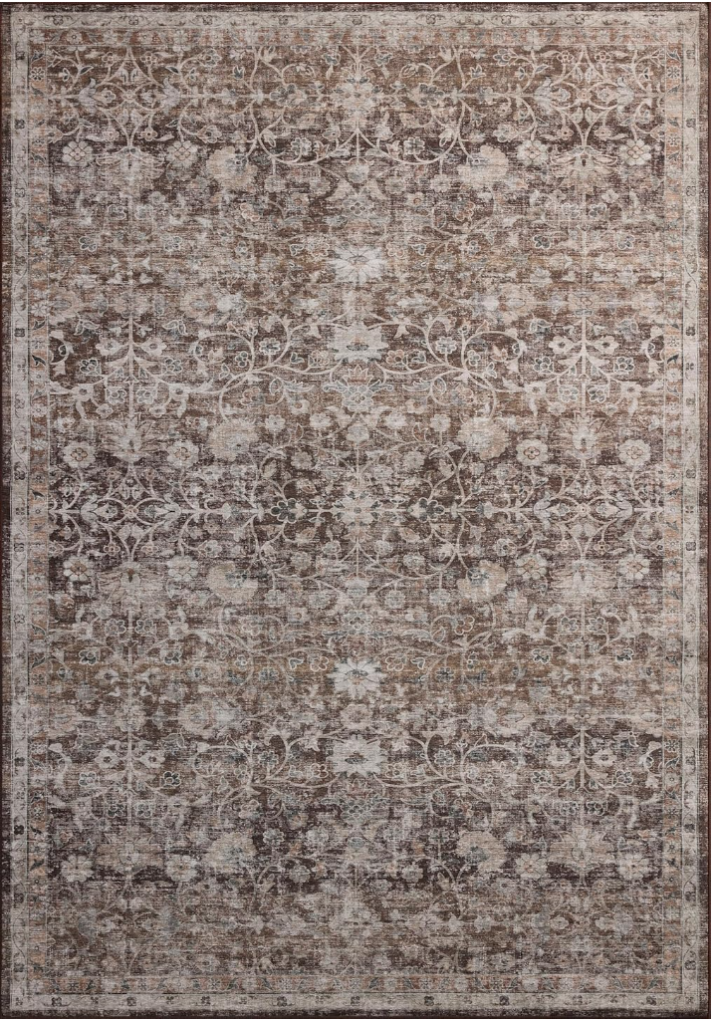 best affordable rugs. Image of vintage pattern rug with browns, purples, pinks, creams, and blues.