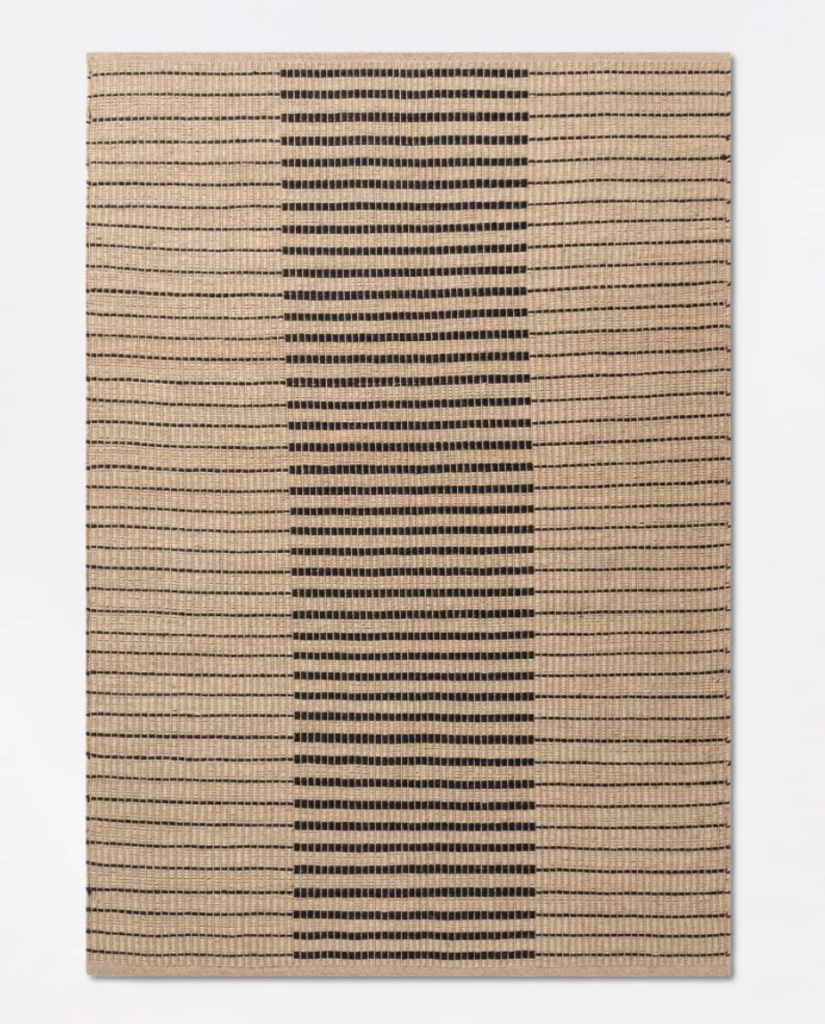just rug. Image of jute rug with thick and thin stripes.