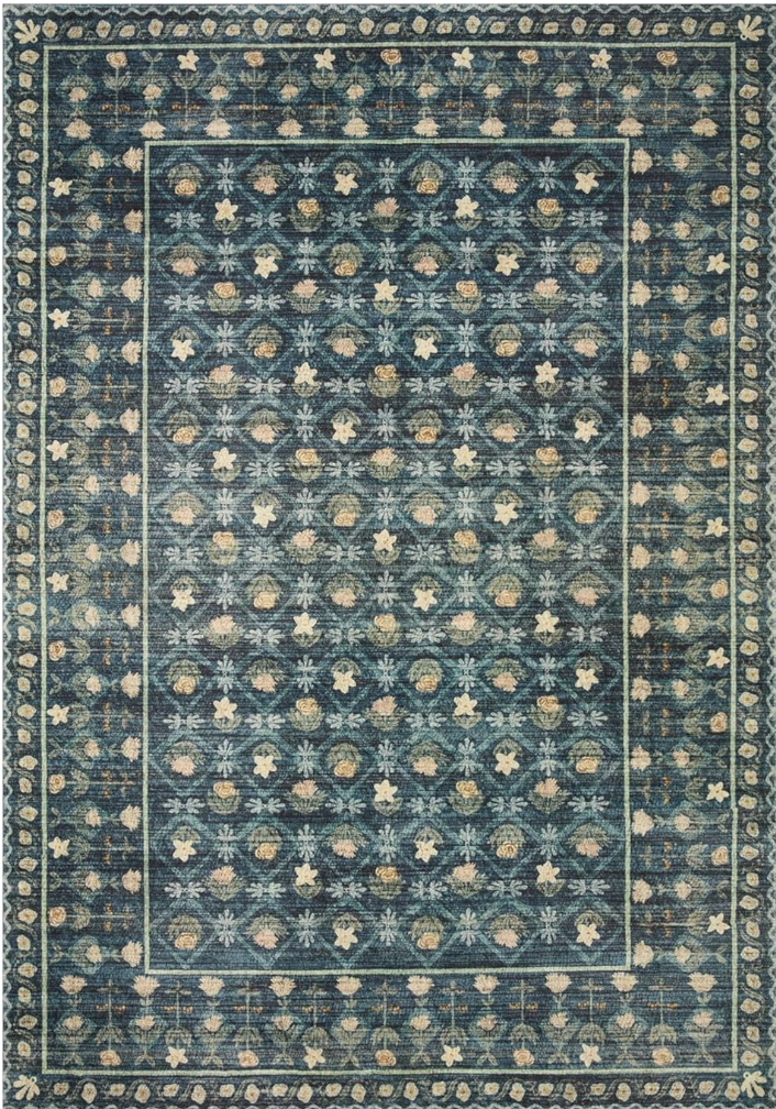 trendy affordable rug. Lattice floral pattern rug with greens, blues, and yellows.