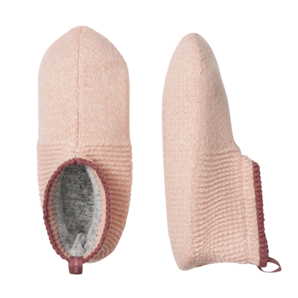 Christmas gift guide for her. Image of pink Bombas Gripper Slipper - knit slipper in light pink with red cuff.