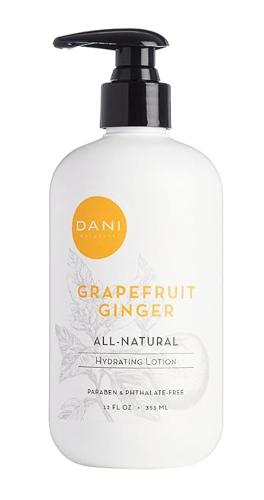 Image of DANI Naturals Grapefruit Ginger lotion with yellow font in white bottle with black pump.