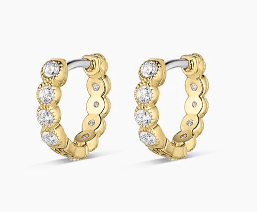Image of gold hoop earrings with diamonds.