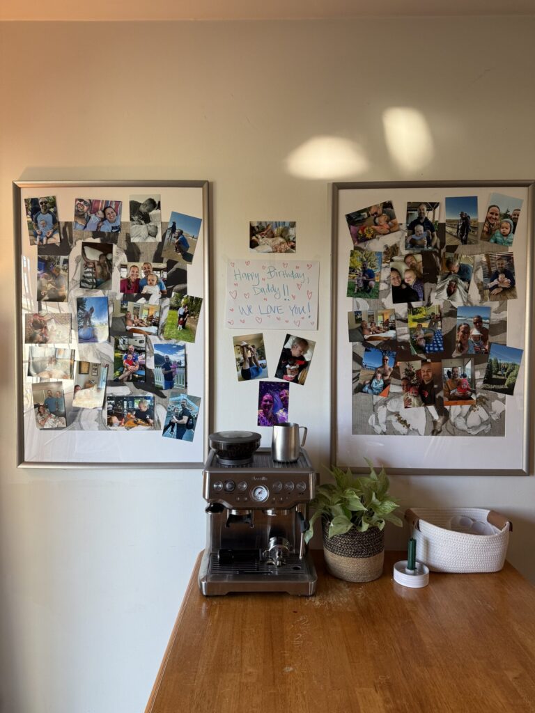 simple birthday tradition ideas. Image of two piece of framed art covered in printed 4x6 photos of family. Picture also has wooden table with espreso machine, plant, green candle, and white fabric storage basket. 