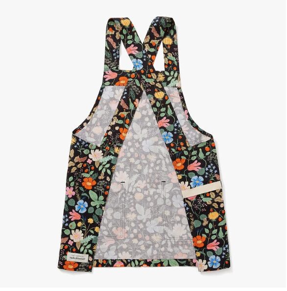 gifts she'll love. Image of floral with dark background pattern pinafore apron.