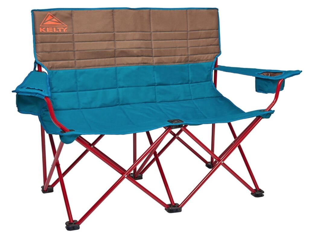 Holiday gift guide. Image of Kelty two seater camp chair that is tan and turquoise with red frame.