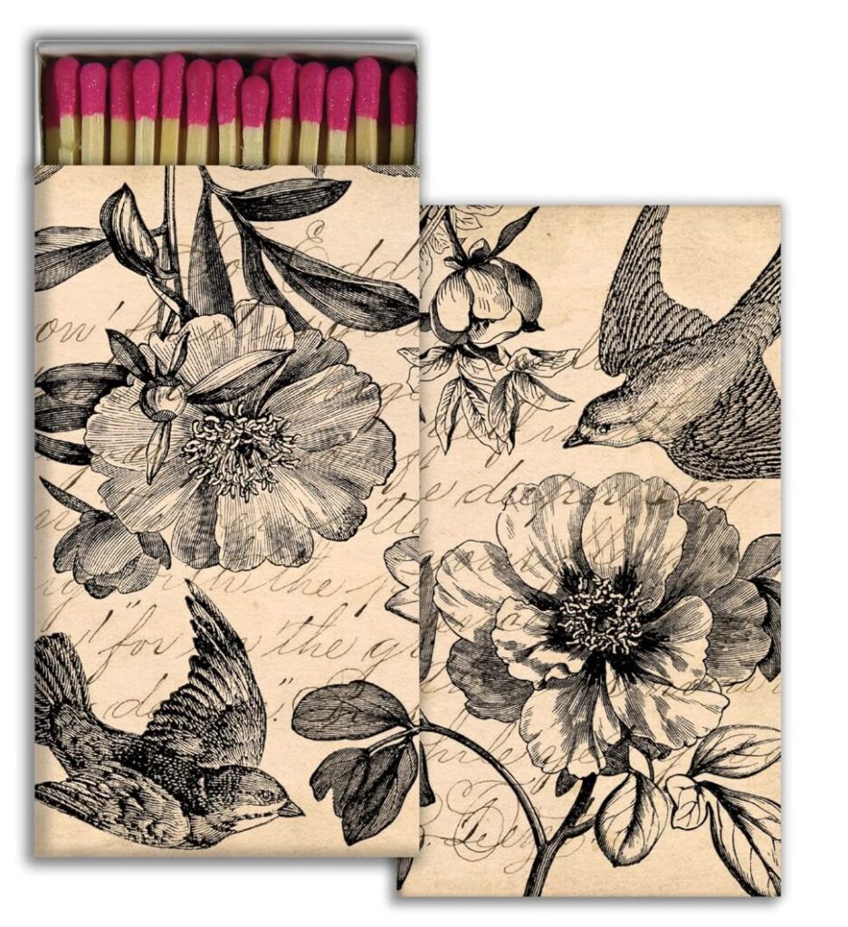 host gift ideas. Image of box of matches in box with birds and flower illustrations in black with beige background. 