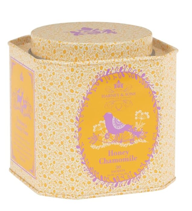 hostess gift idea. Image of tea canister with yellow floral pattern and purple bird on label, honey chamomile blend.