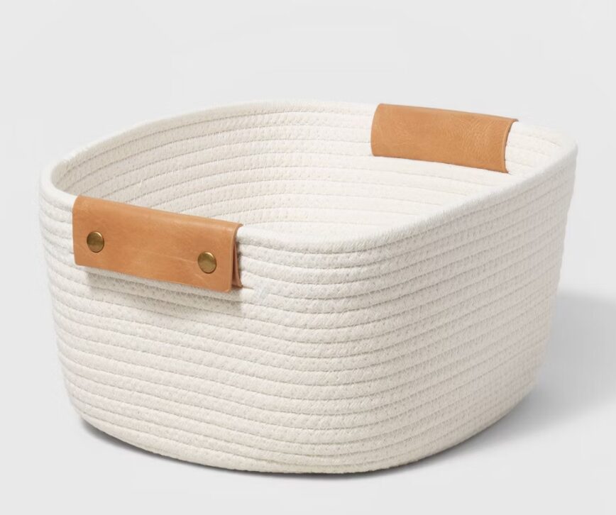 hostess gift. Image of cream coiled grope basket with leather handles. 