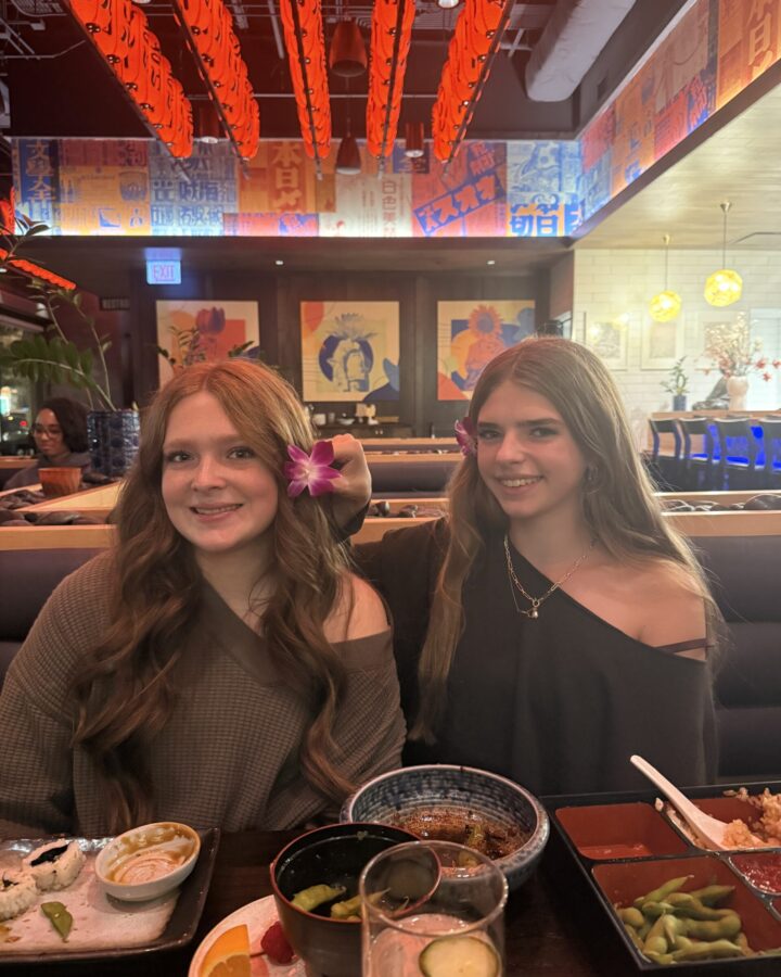 tips for having meaningful conversations with kids. Image of two teen girls at restaurant.