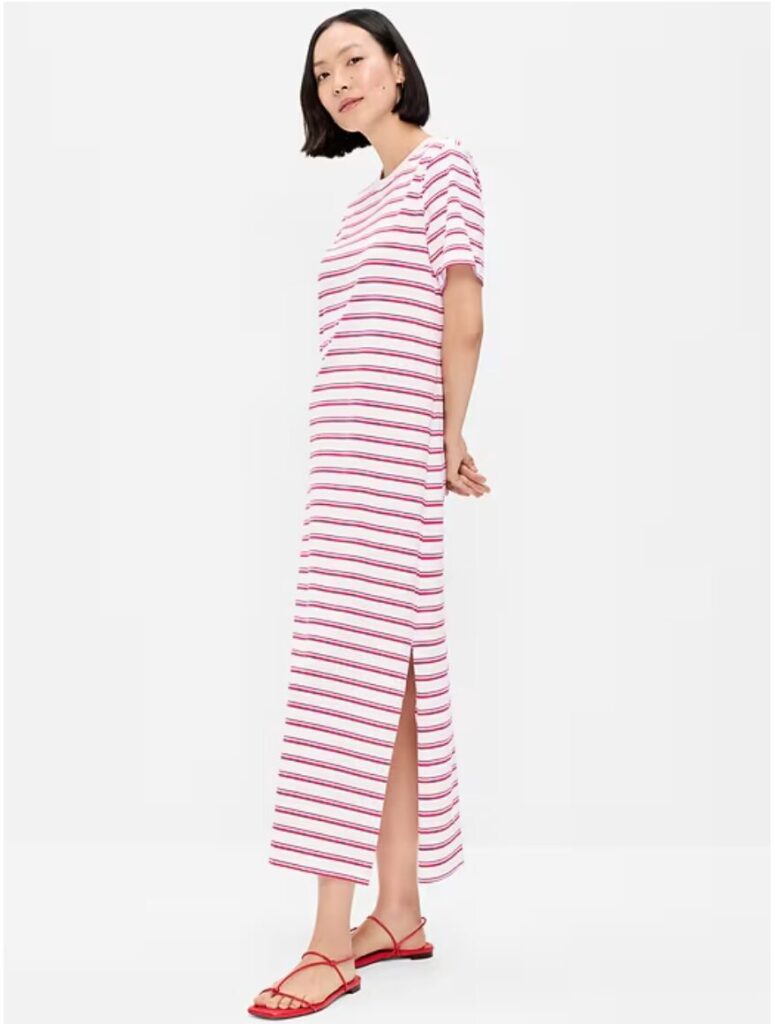 woman wearing Vintage Crew-Neck Maxi T-Shirt Dress in pink and white stripes with red shoes.
